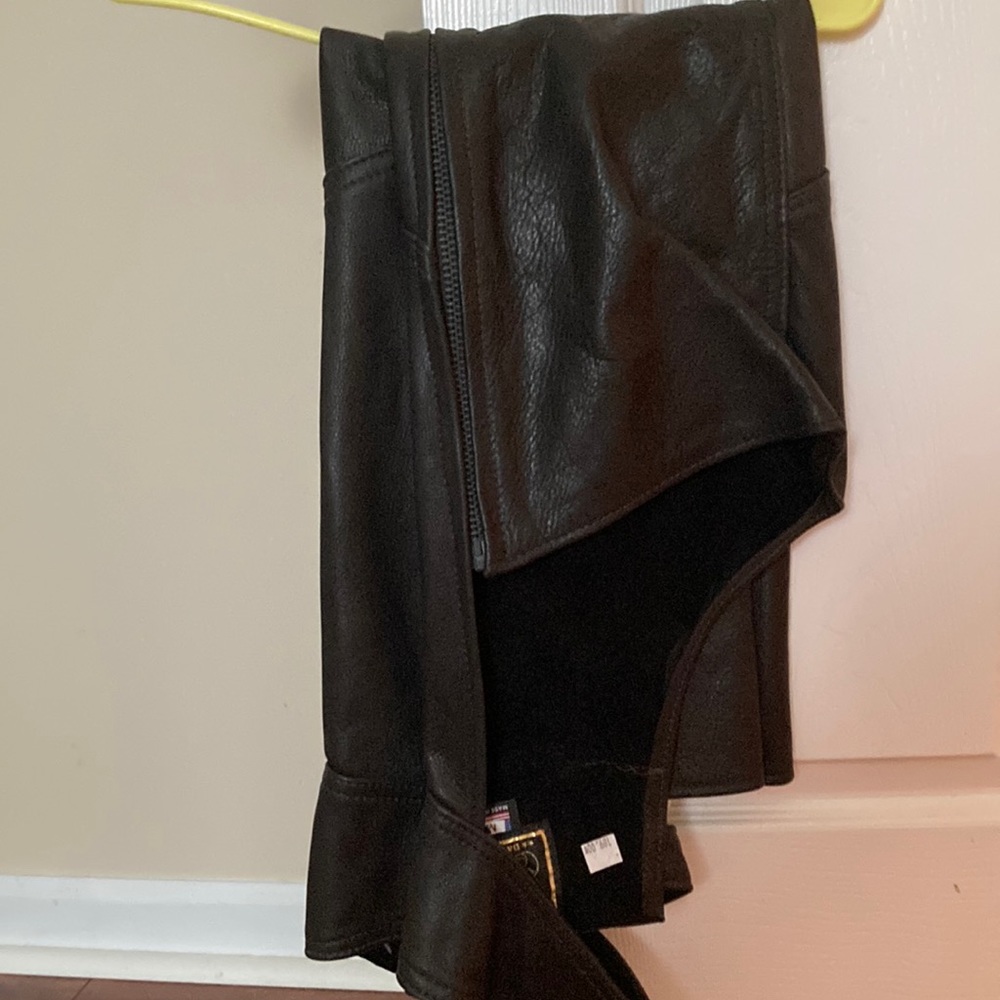 Black leather motorcycle chaps, size Medium, never worn